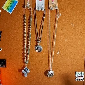 NWT 3 Beautiful Necklaces with matching earrings.